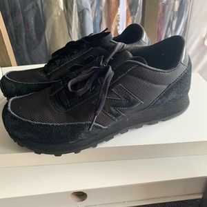 All black new balance sneakers